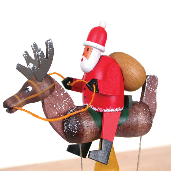 Santa Claus on a Reindeer Pendulum Toy