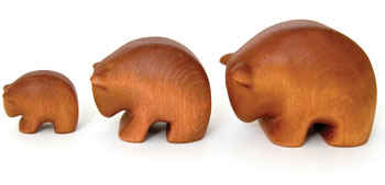 Three wooden bear figures
